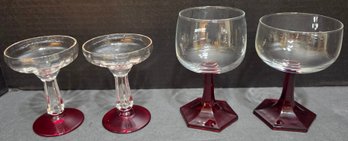Pair Of Vintage Clear Glass Coupe Glasses With Faceted Ruby Stems/bases And Pair Of Ruby Wine Glasses