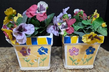 Mosaic Flower Planters Featuring A Yellow And Blue Striped Rim And Floral Patterns With Faux Flowers