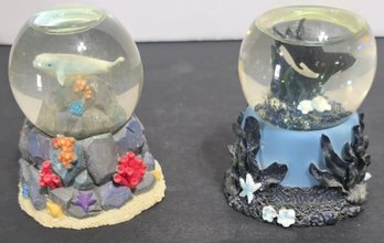 Pair Of Vintage SeaWorld Vintage SeaWorld Snow Globes Featuring A Beluga Whale And An Orca