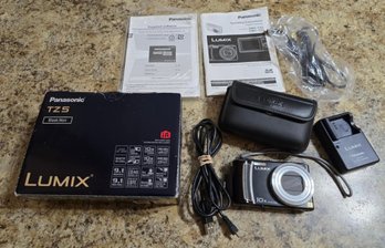 Panasonic TZ5 Lumix Digital Camera. Comes With Cords, Software, Carrying Case And Battery Charger - Untested