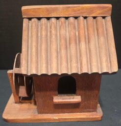 Appears To Be A Small, Decorative Wooden Water Mill