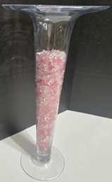 Clear Glass Trumpet Vase Filled With Pink And White Decorative Stones