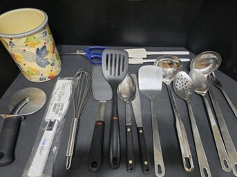 Group Of Utensils In Ceramic Holder