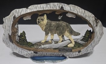 Wolf Statue With A Rocky Mountain National Park Emblem On It