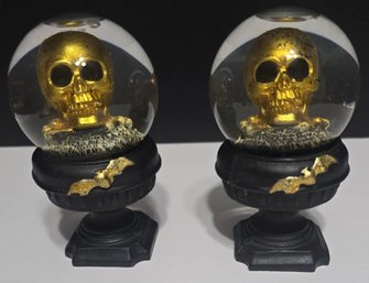 Pair Of Gold Skull Waterglobes