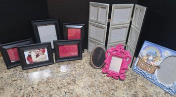 Group Of Mixed Sizes And Style Picture Frames
