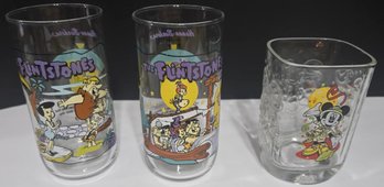 Hardees Flintstones Glass Tumbler (2) And A McDonalds Walt Disney Commemorative Glass