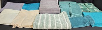Collection Of Used Towels And Restroom Rug