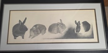 Appears To Be Framed Panoramic Drawing Featuring Four Rabbits In Different Positions