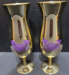 Pair Of Gold-colored Hurricane Glasses Are Souvenirs From The Tropicana Las Vegas Casino And Hotel