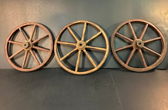 Three Wooden Antique Wheels