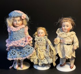 Three Antique Small Bisque Dolls