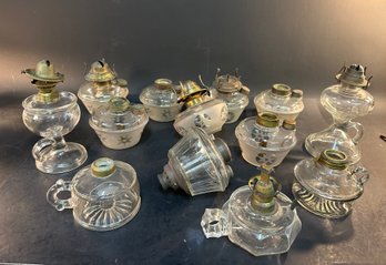 Group Of Finger Lamps And Fitted Bases