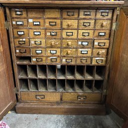 An Oak File Cabinet  With Doors