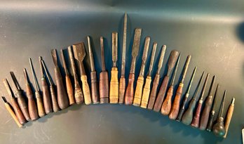 A Group Of Chisels And Awls