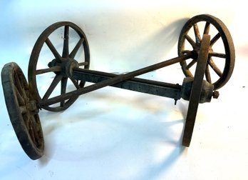 Two Pairs Of Wheels With Axels