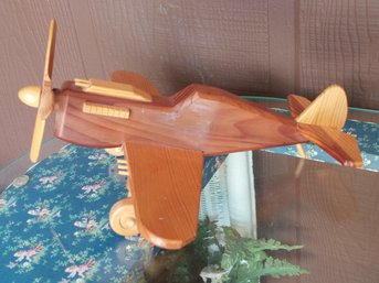 1980s Handcrafted Wooden Model Airplane With A Polished Finish And Carved Propeller