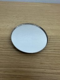 Mirror With A Silver Cover