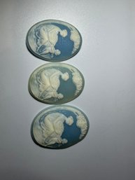 Three Oval Flat-back Blue Background And A White Craft Cameos