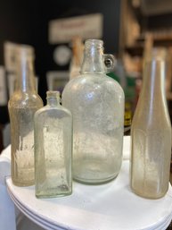 4 Vintage Clear Glass Bottles