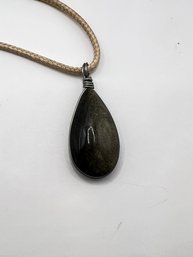 Crystal Drop Pendant With Tan Cord