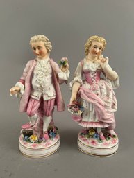 Pair Of Bisque Porcelain Figures