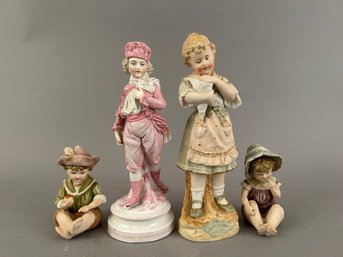Four Bisque Porcelain Figurines