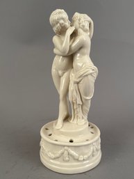 Porcelain Flower Frog With Embracing Lovers