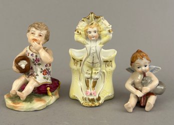 Three Small Figurines