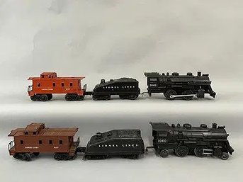 Two Lionel Locomotives With Tenders And Caboose O Gauge