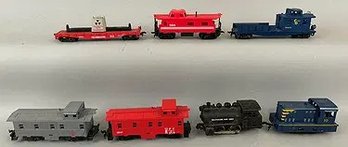 Seven HO Gauge Trains