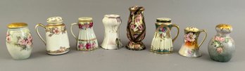 Eight Porcelain Shakers With Floral Designs