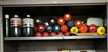 Shelf Full Of Propane Tanks, Most Empty