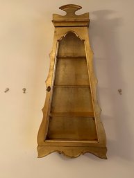 Pyramid Shaped Knickknack Shelf With Gold Colored Paint