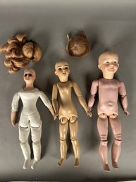 Three Porcelain Dolls