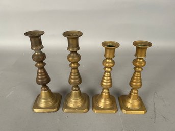 Set A Four Brass Push Up Candlesticks