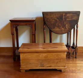 Three Pieces Of Furniture Including Two Tables And Child Size Cedar Chest