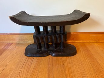 Small Foot Stool Made Of A Single Piece Of Carved Wood