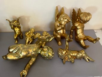Seven Large Cherub Statues Including Three Playing Musical Instruments