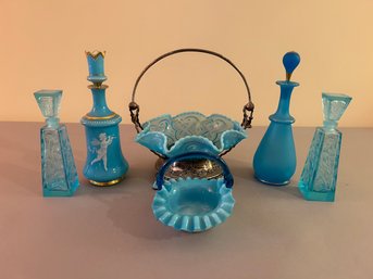 Six Piece Of Blue Glass Including Decanters And Baskets