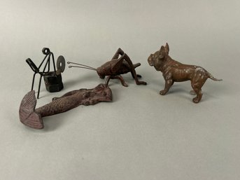 Four Vintage Metal Figurines