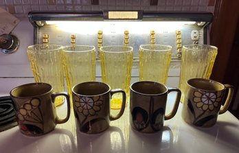 Cup And Glassware Lot - 5 Amber Colored Glasses - 4 Stoneware Mugs - K25
