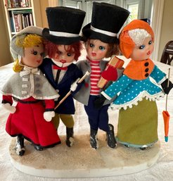 4 Vintage Christmas Carolers Attached To Glitter Topped Base - 2