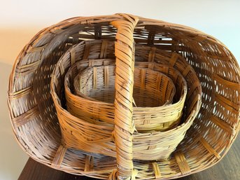 Four Nested Wicker Baskets With Handles - 26