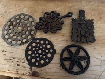 Vintage Cast Iron Of 5 Trivets .. Very Nice