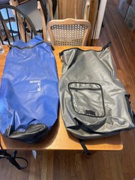 A Dakine Waterproof Backpack And A Sport Divers Dry Bag