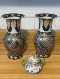 Pair Of Vases And A Covered Jar