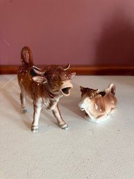 A Pair Of Porcelain Cow Creamers Bavaria