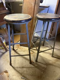 A Pair Of Vintage Metal Stools With Wooden Seats