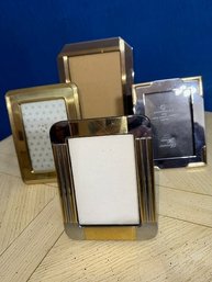 A Collection Of Metal Photo Frames 4 X 6 And 5 X 7'